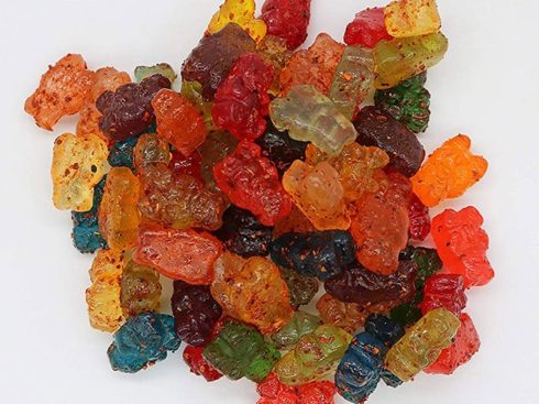 A bag of colorful Chamoy candies, covered with a fine layer of spicy sauce, in various shapes